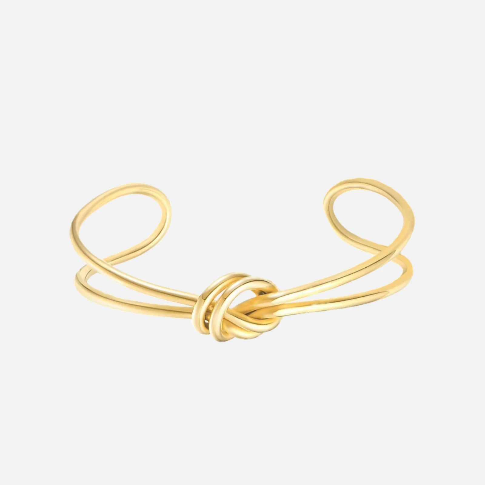 Double Knot Bangle — studio shot on light grey