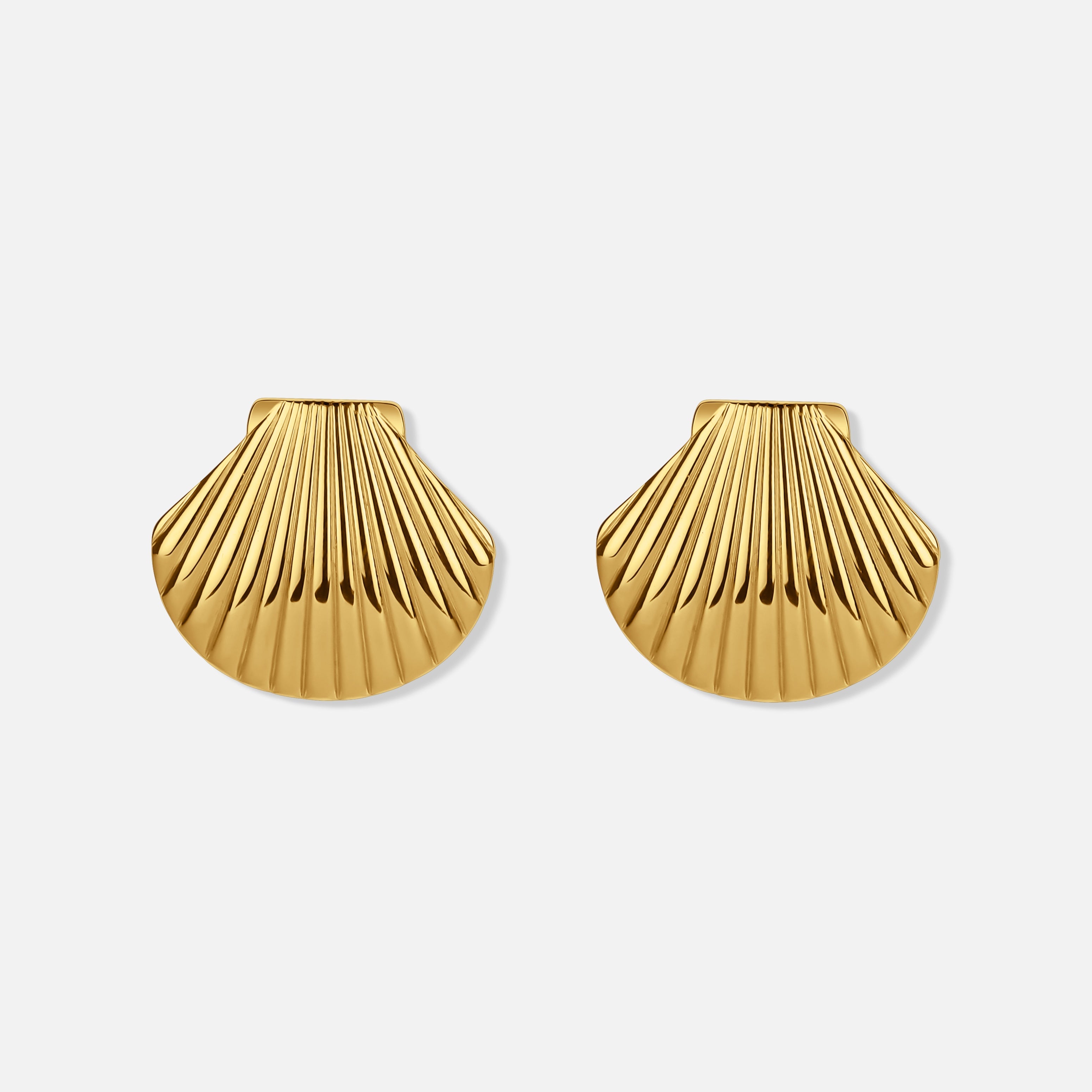 Seashell Earrings — studio shot on light grey