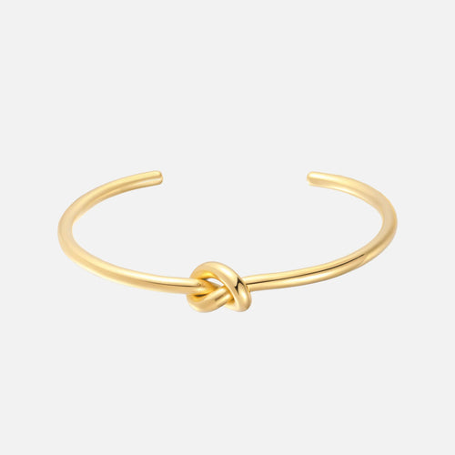 Knot Bangle — studio shot on light grey